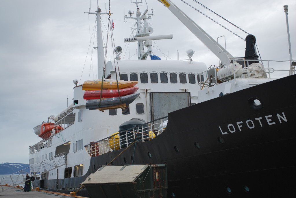 Lofoten is a working ship with all cargo crane-loaded in and out of the hold. * Photo: Ted Scull