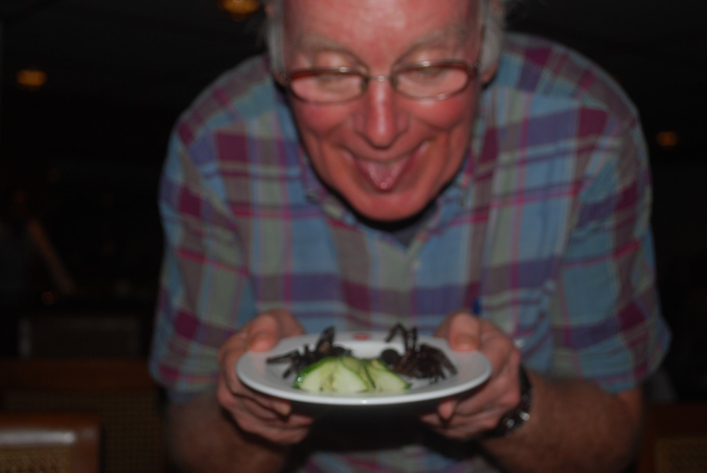 Ted samples the local delicacies! * Photo: Ted Scull