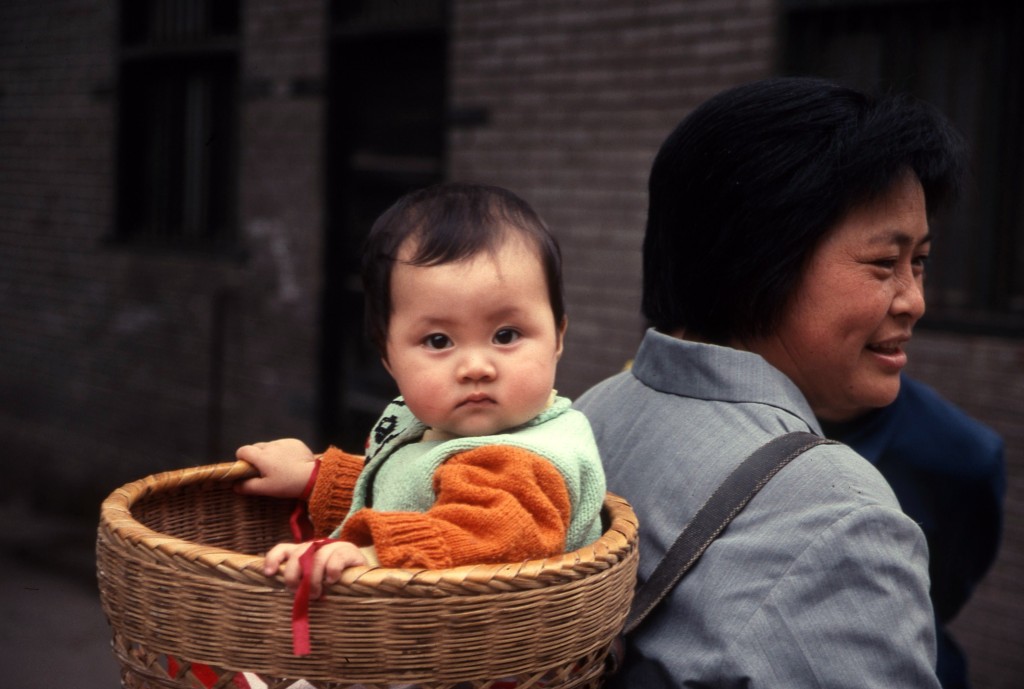 Mother and child pass during a village stop along the Yangtze.