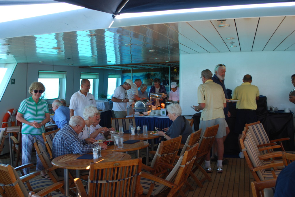 Orion: Lunchtime on deck. * Photo: Ted Scull