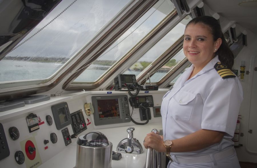 Lady captain Nathaly Albán at the helm of Celebrity-Xploration