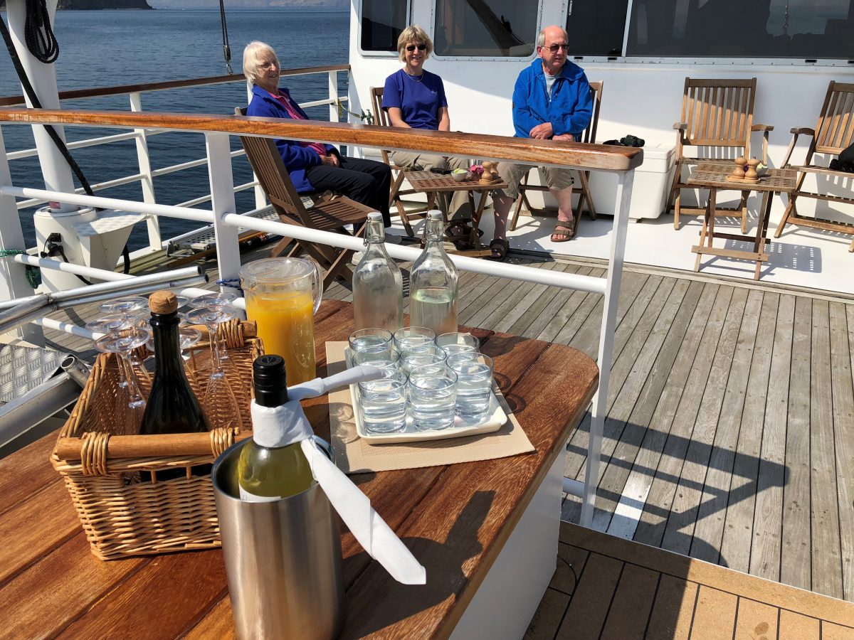 drinks on deck in the Hebrides