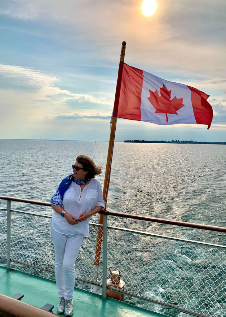 Judi on deck of St. Lawrence Cruise Lines’ Canadian Empress