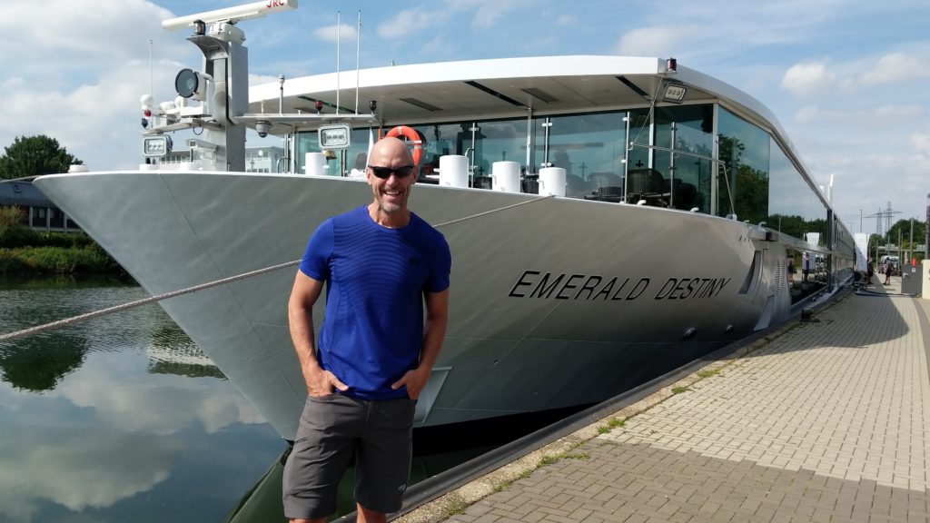 John in front of Emerald Destiny on a Danube cruise