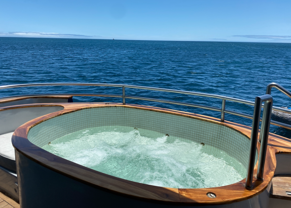relaxing in a hot tub on an Ecoventura Galapagos cruise 