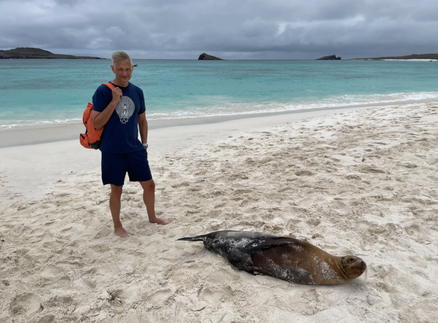 Peter & Sea Lion pup while Lindblad Galapagos Cruising