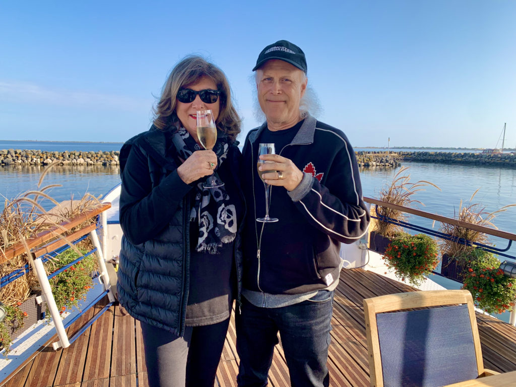 Judi & Lawrence at embarkation toast on Anjodi in Marseillan