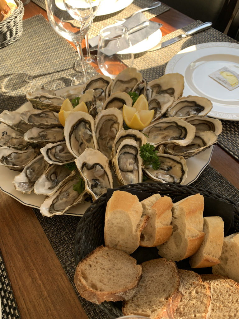 fresh oysters from the market in Narbonne on an Anjodi barge cruise