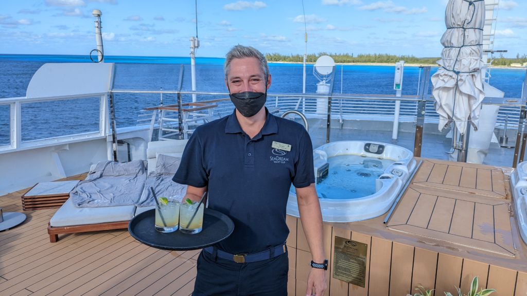 Gareth the Head Bartender serving on deck of Sea Dream II