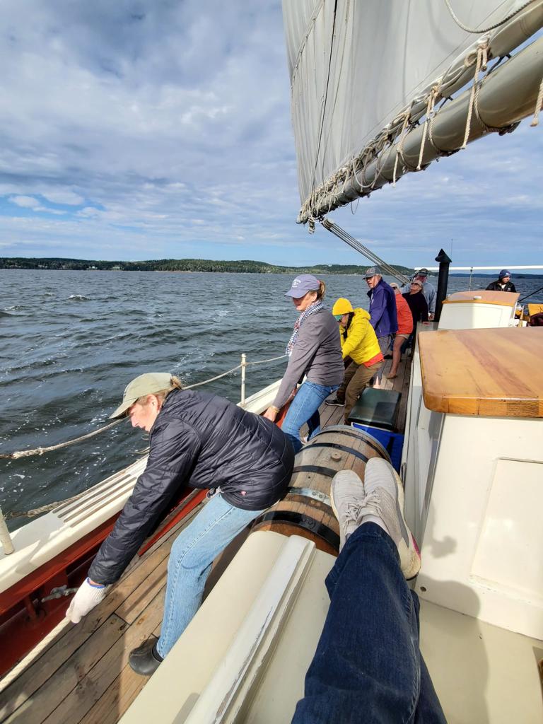 hoisting the sails on the Maine Windjammer Riggin