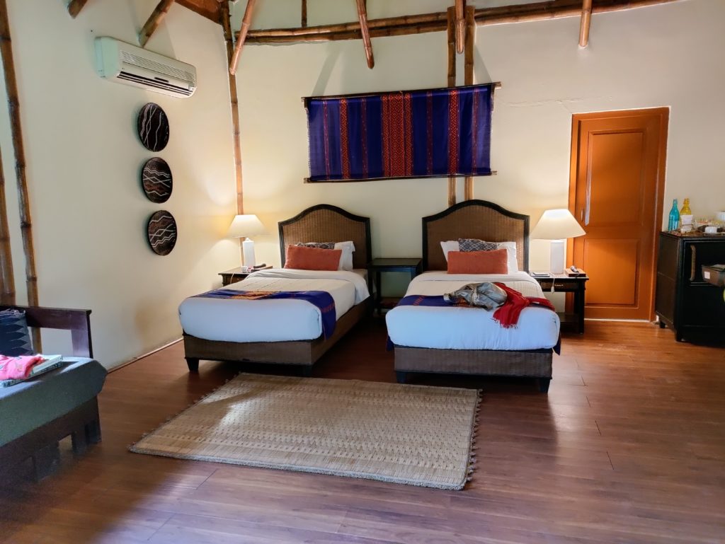 The interior of a charming Diphlu River Lodge room