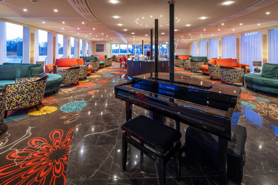 A daily Sip & Sail cocktail hour is hosted in AmaKristina's lounge on Ama Waterways Black Heritage cruise