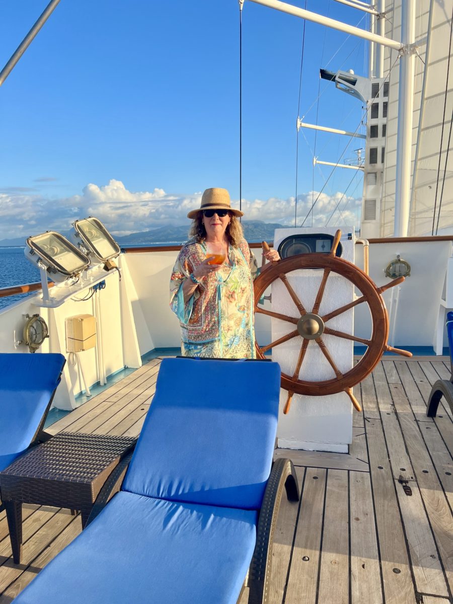 Aperol Spritz on the stern of Wind Star enjoyed by the author of a Windstar Tahiti cruise review