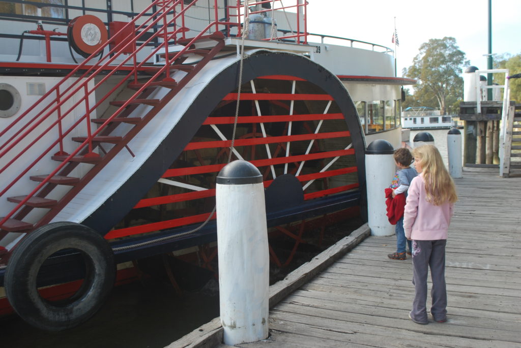 2 kids looking at the sidewheeler of Australia's Murray River