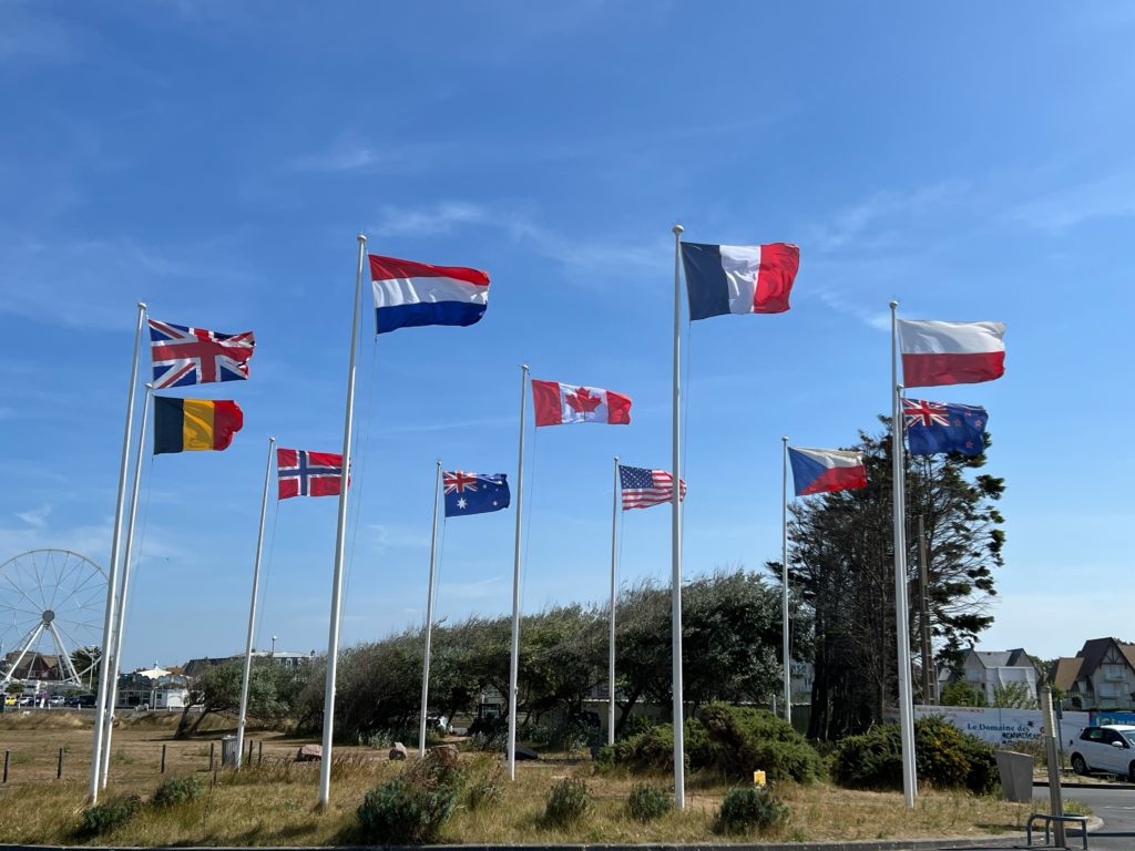 Clusters of Allies’ flags flutter at every Normandy site that commemorates D-Day