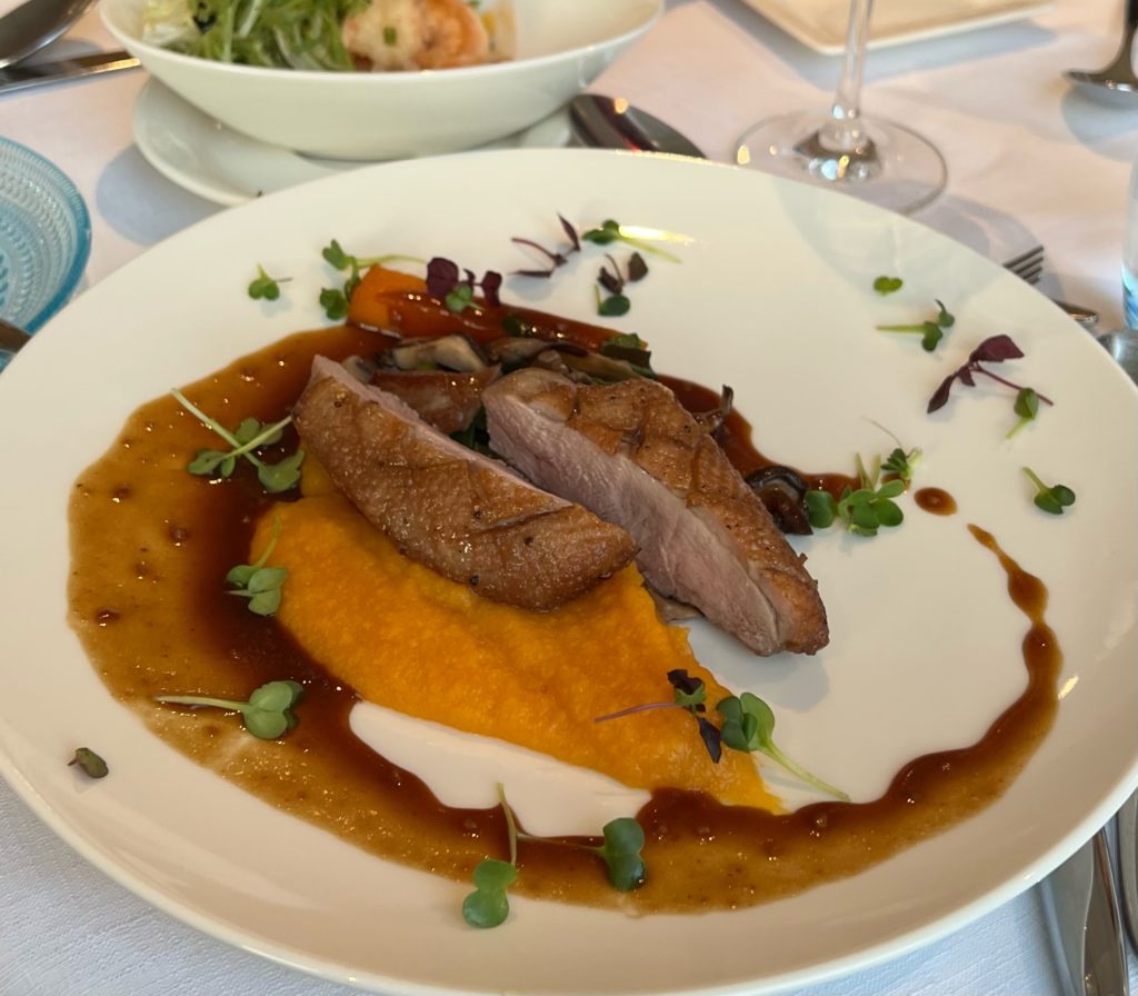 Roast duck breast with shiitake mushrooms on a Seine River cruise