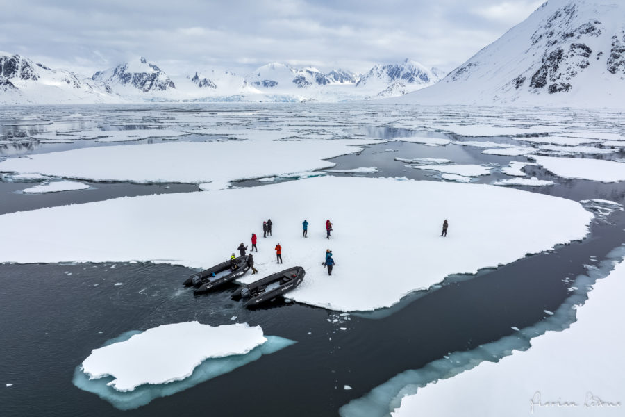 The 2 Zodiacs take guests to ice flows in a Svalbard fjord