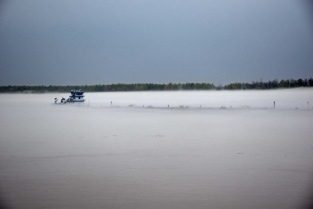 river shrouded in fog