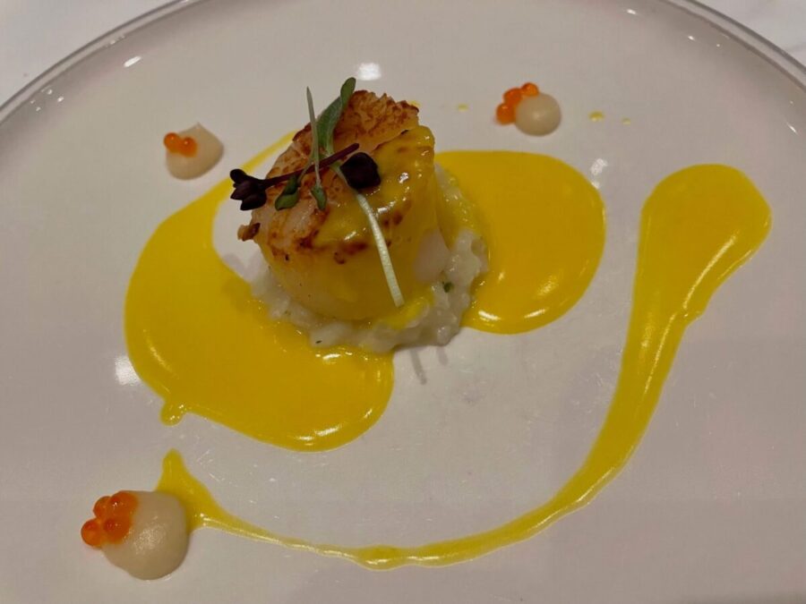 Tauck on the Seine River cruise serves cuisine like this scallop appetizer in the Compass Rose dining room.