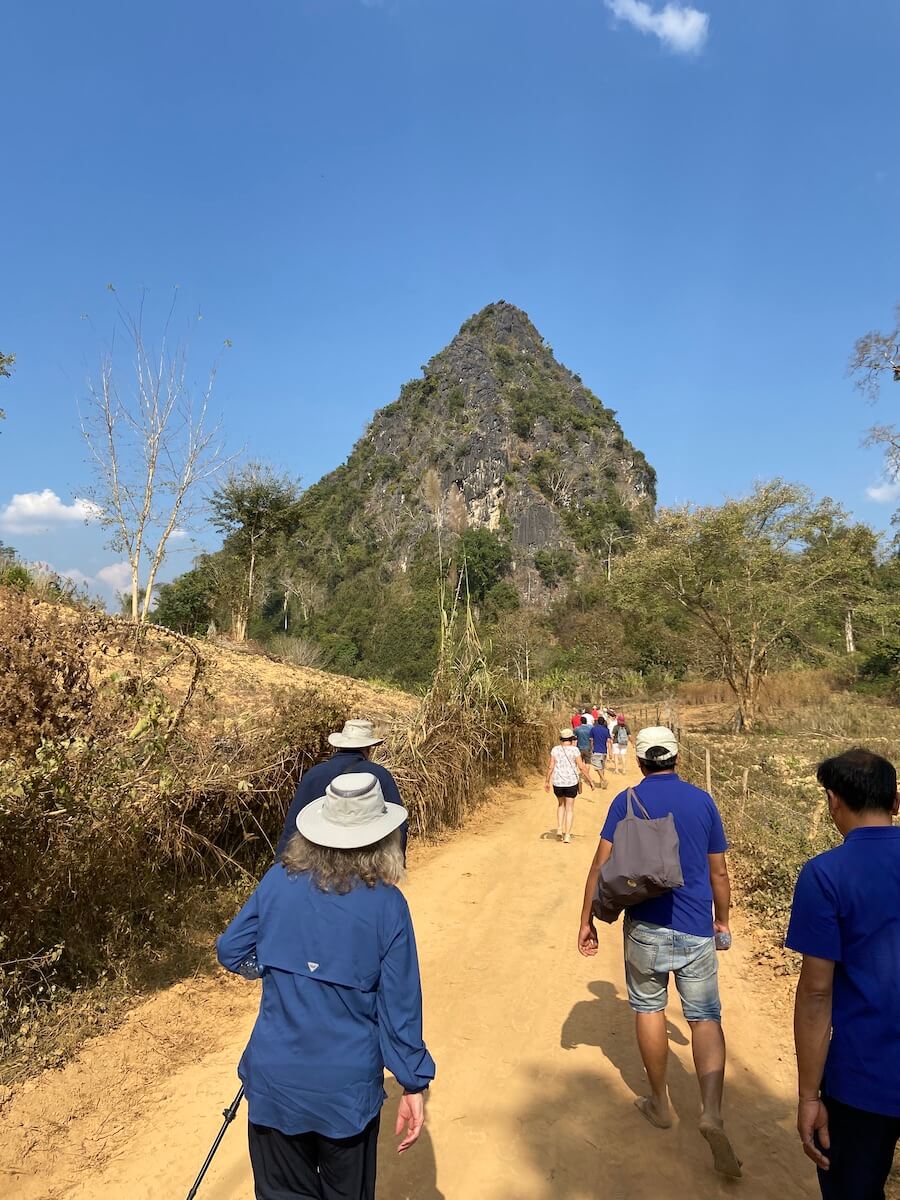 walk to the secret cave on our Upper Mekong River cruise