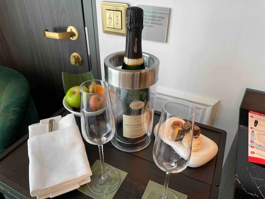 Riverside Ravel welcome gifts include a bottle of bubbly