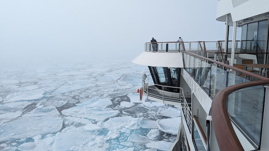 Pushing through the ice, with the help of views from the bridge wings of Nat Geo Resolution