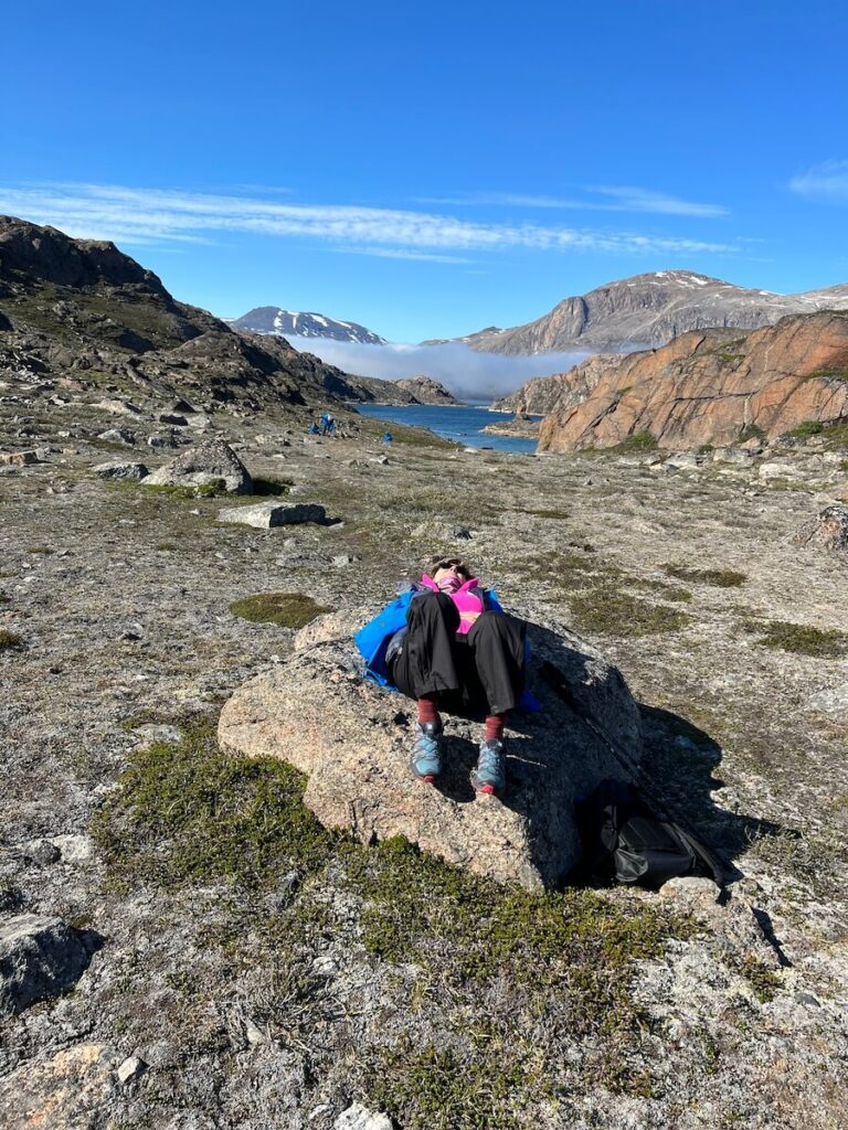 Judi taking a rest during a hike in Tasiussiag, Greenland