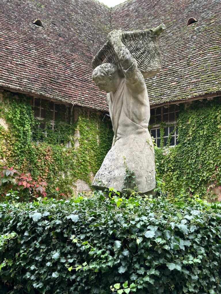 statue on the grounds of Chateau du Clos Vougeot