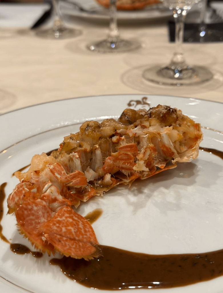 French Country Waterways' Adrienne serves lobster tails