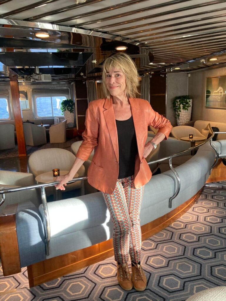 Author Judi Cuervo in the Sea Dream II's salon on a SeaDream Transatlantic Crossing