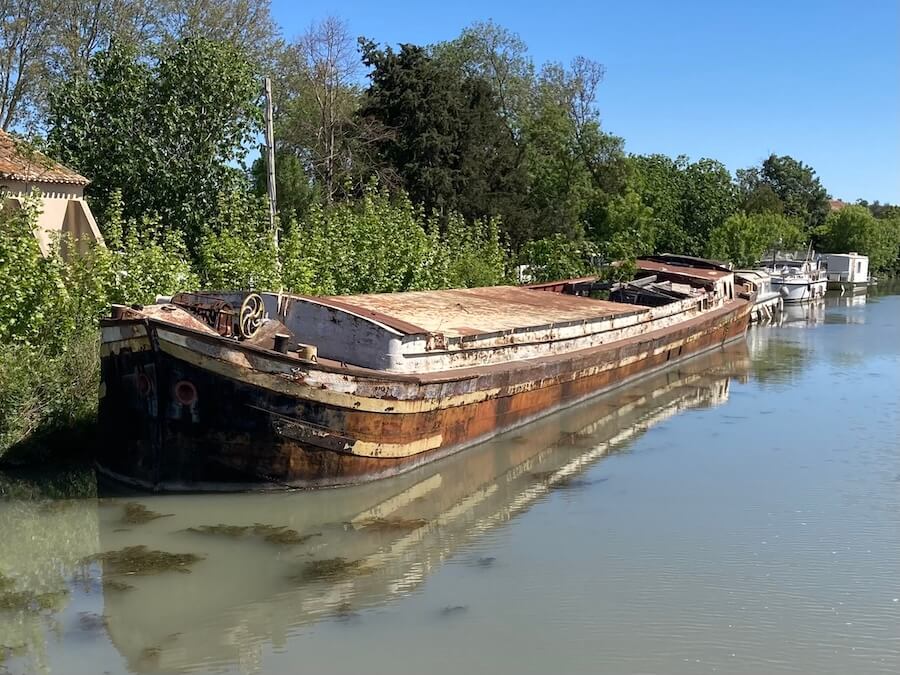 A Roi Soleil Barge Cruise provides some fascinating scenery of old boats along the way