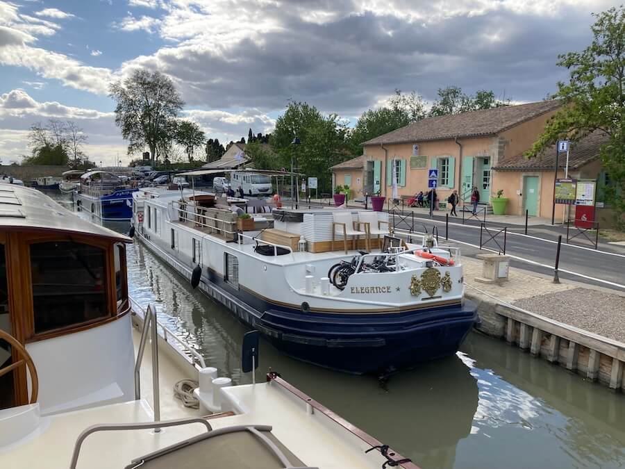 Roi Soleil Barge Cruise docked next to two colleagues