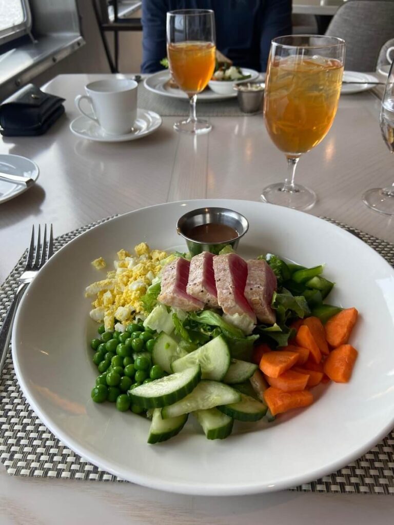 Chicken pot pie on American Eagle dinner options include Cobb salad