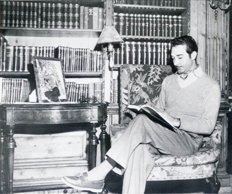 Ramfis Trujillo poses with a photo of Kim Novak on board while the Angelita was docked in Los Angeles in 1958