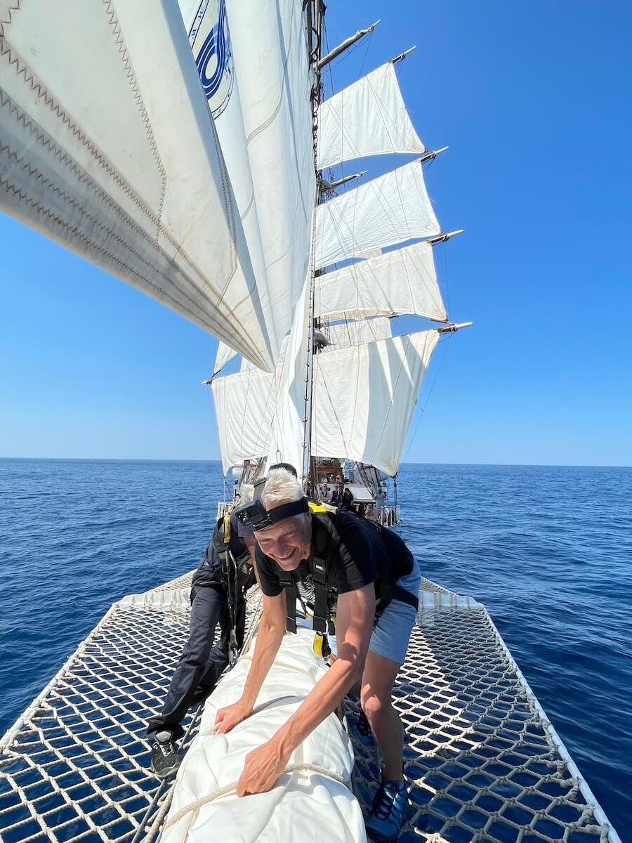 Peter in bowsprit of Sea Cloud