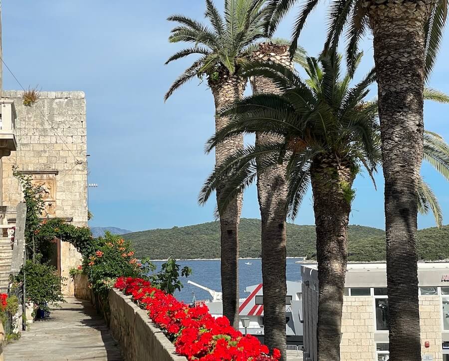 Visiting a A Korčula walkway on a Croatia Yacht Cruise