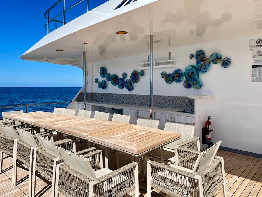 Upper deck  dining area on Alya on a Galapagos Cruise