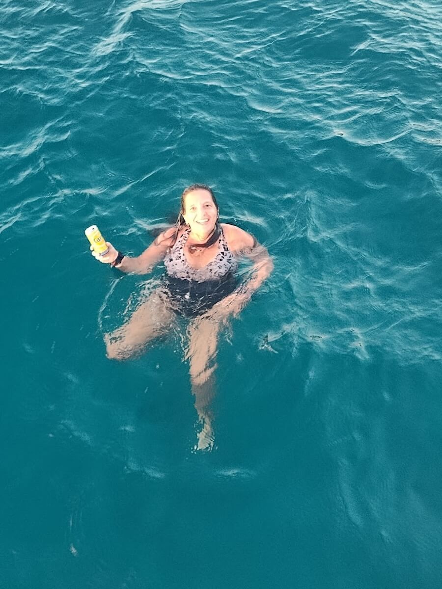 Enjoying a beer in the Caribbean sea!