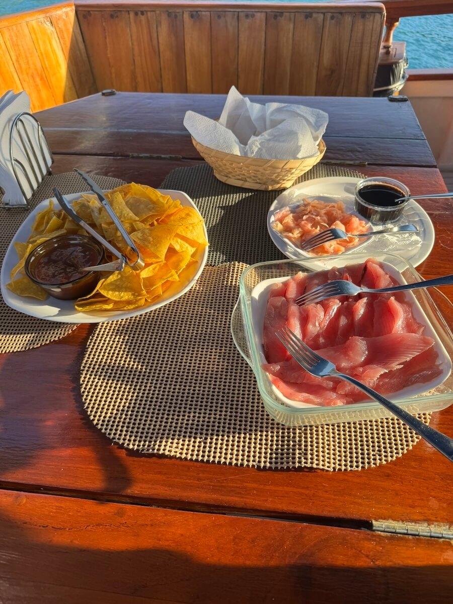 Island WIndjammer reviews dicusses food, like the Fresh caught sashimi tuna for happy hour snacks. 