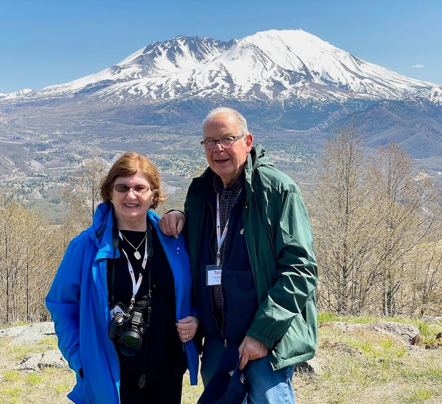 American Harmony Columbia and Snake Rivers Cruise — A Review of Scenic Riverboating on the Trail of Lewis and Clark 19 Sandra & John Nowlan, with Mt St Helens in the background
