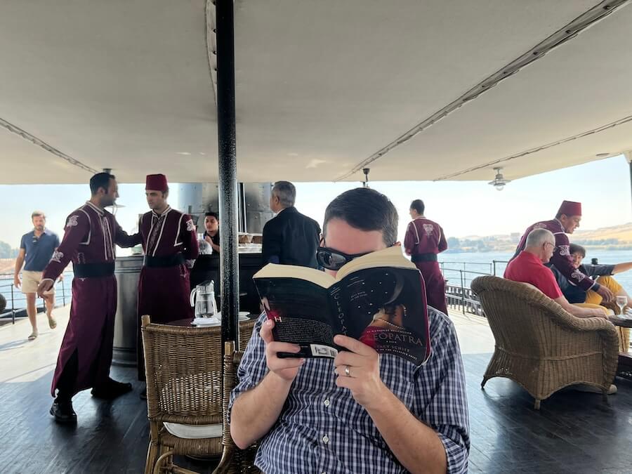 Reading a biography of Cleopatra on the sun deck on a Nile River Cruise on the S.S. Sudan