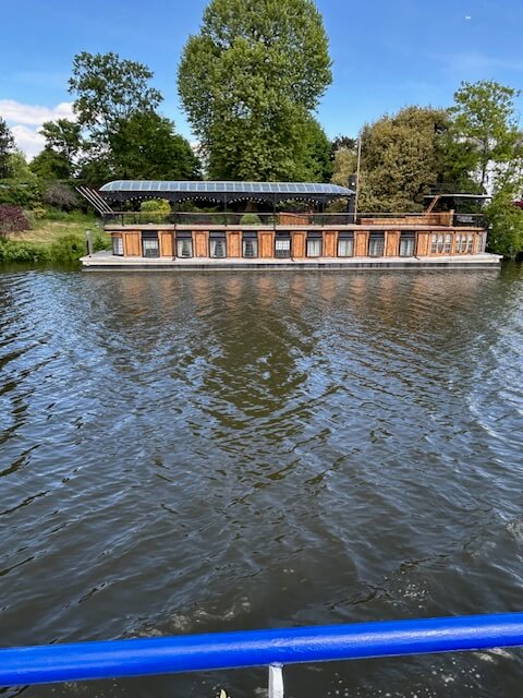 David Gilmore's "Astoria" studio barge, as seen on the Thames River aboard the Magna Carta