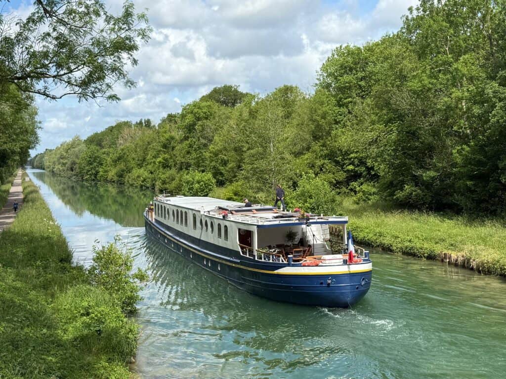 Kir Royale slowly glides down the Marne Canal.
