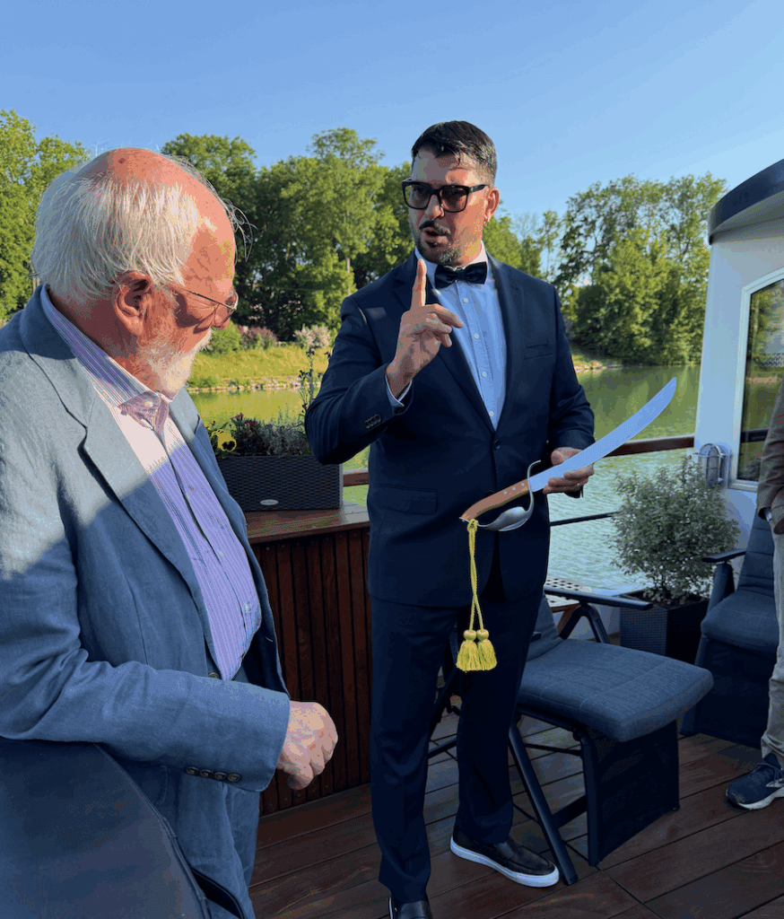 A guest was invited to sabre the Champagne aboard Kir Royale