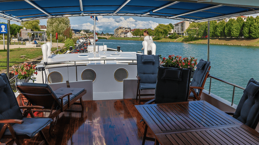 A relaxing sun deck with shaded seating