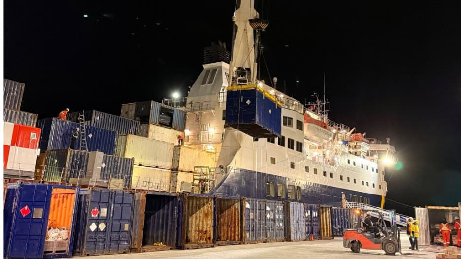 Cargo being loading on and off of the Bella Desgagnés cargo passenger vessel