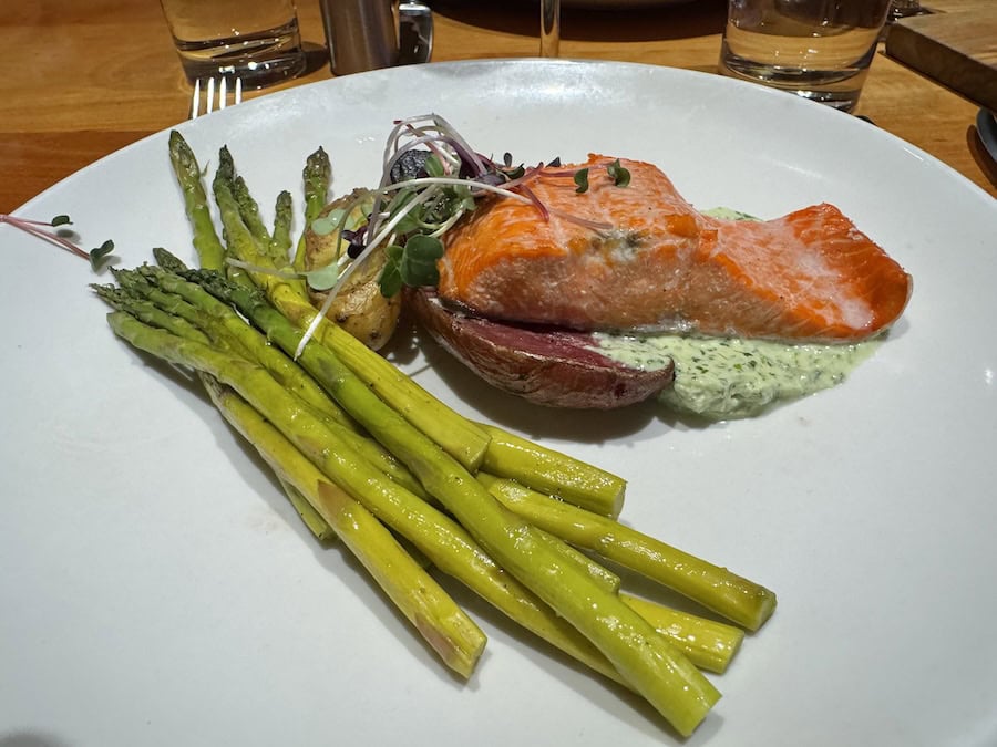salmon dinner served on a Wilderness Legacy Cruise Ship Review