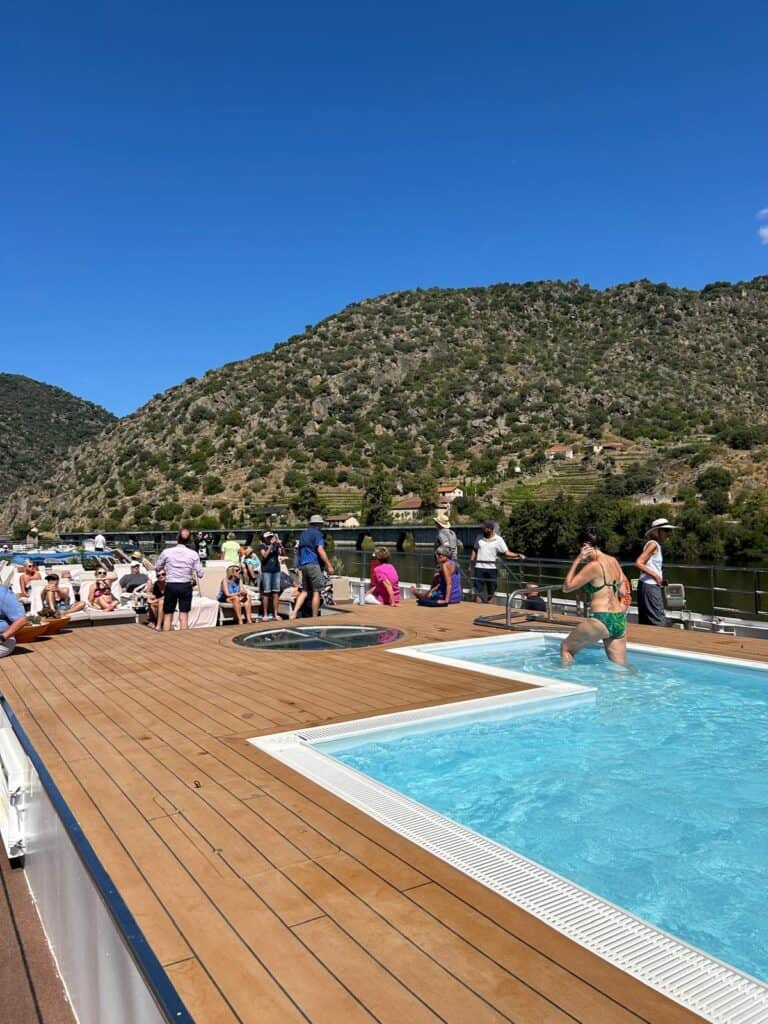 Douro River Cruise Review (2026): Why Uniworld Does Everything Right 7 Cooling off in Sao Gabriel's pool on a Douro River cruise