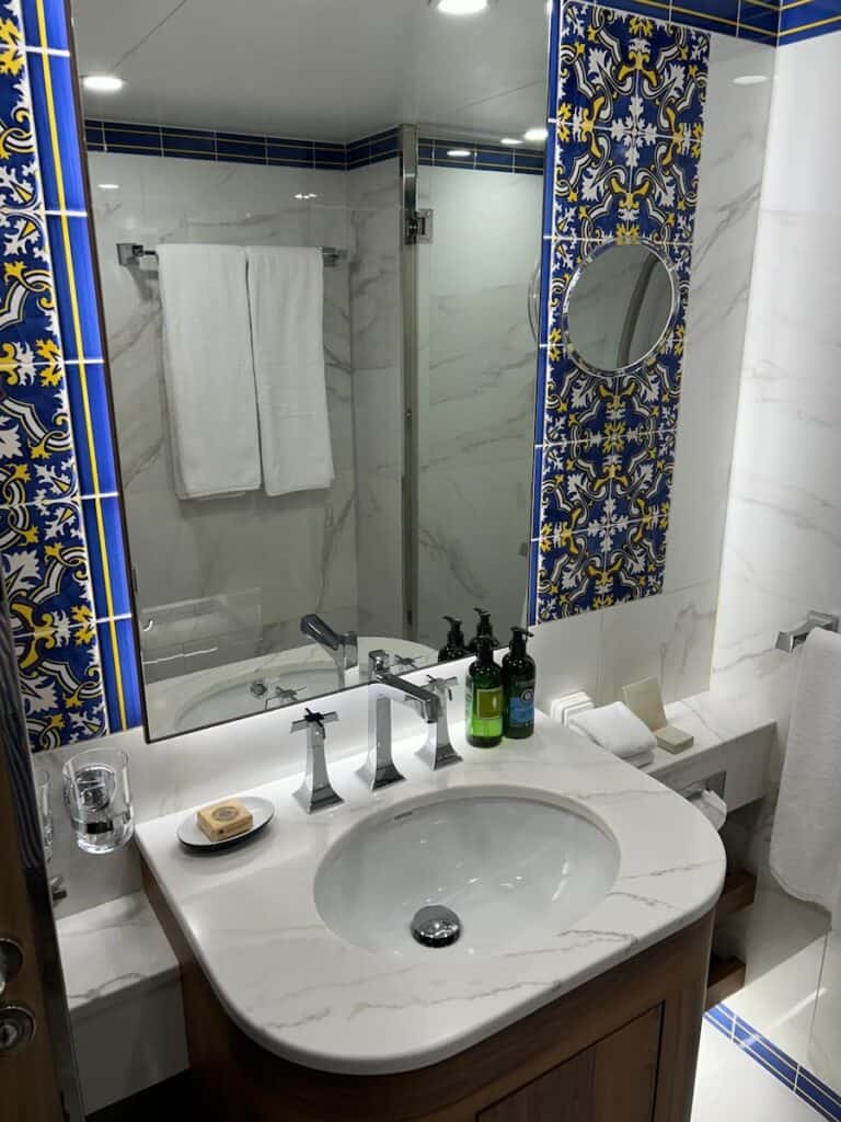 Douro River Cruise Review (2026): Why Uniworld Does Everything Right 25 Decorative tiles in the cabin bathroom
