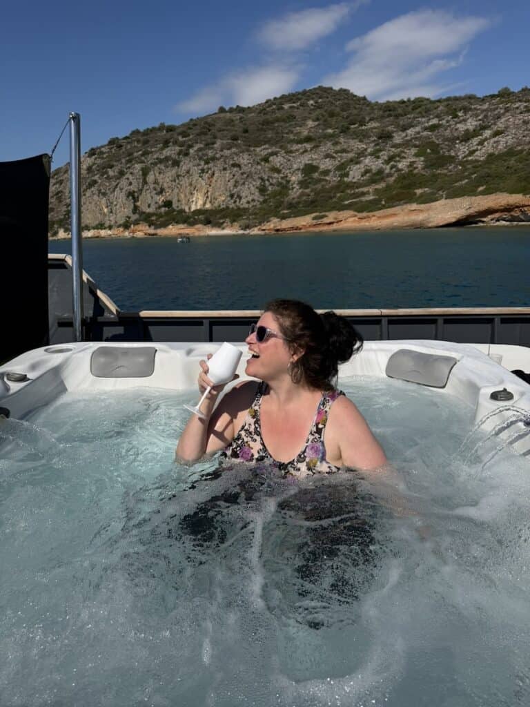 Greek Isles Yacht Cruise Review include details about the top deck and hot tub